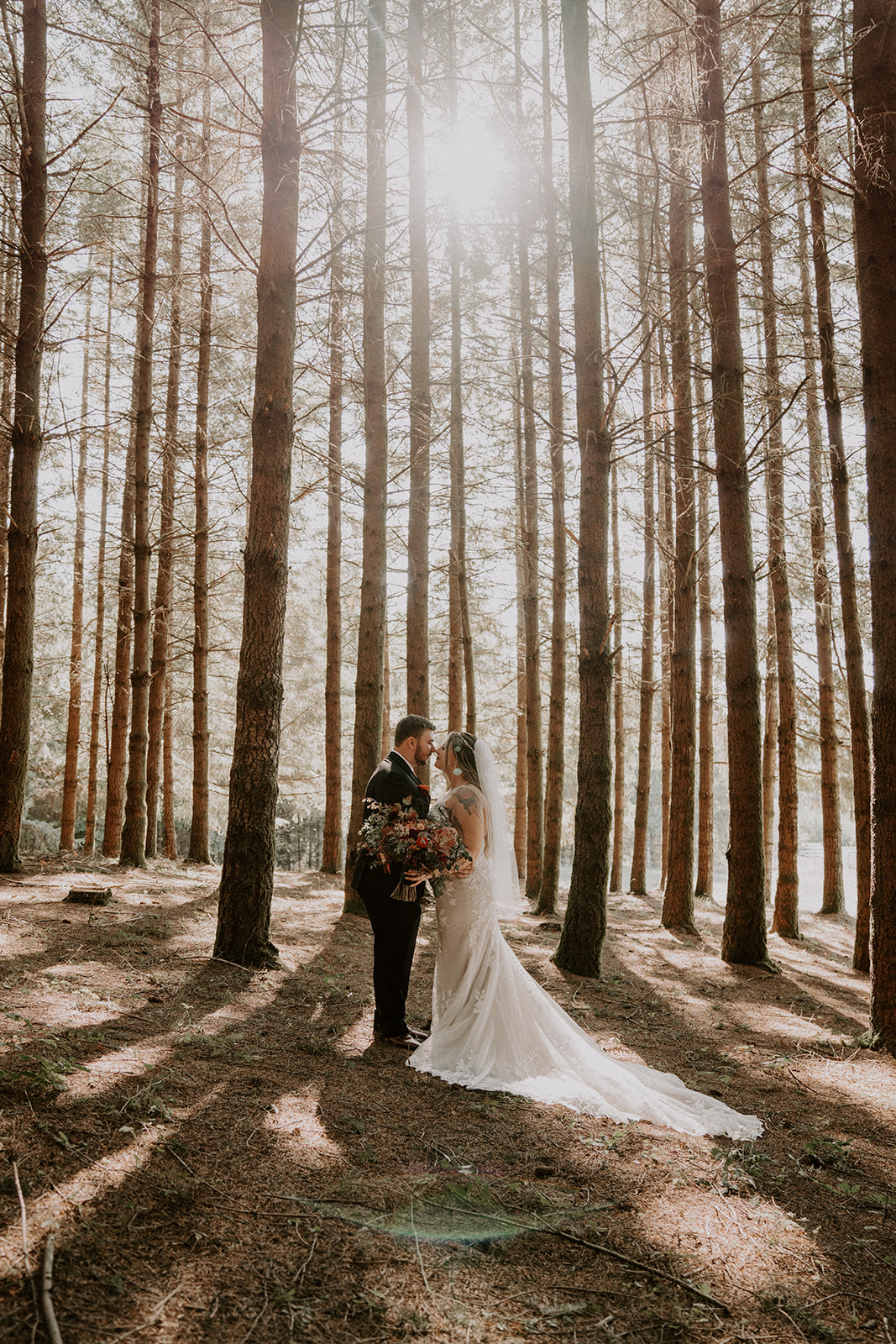 Tall trees and bride and groom during first look - Woodsy Wedding